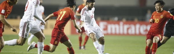  国足世预赛关键战惜败韩国队